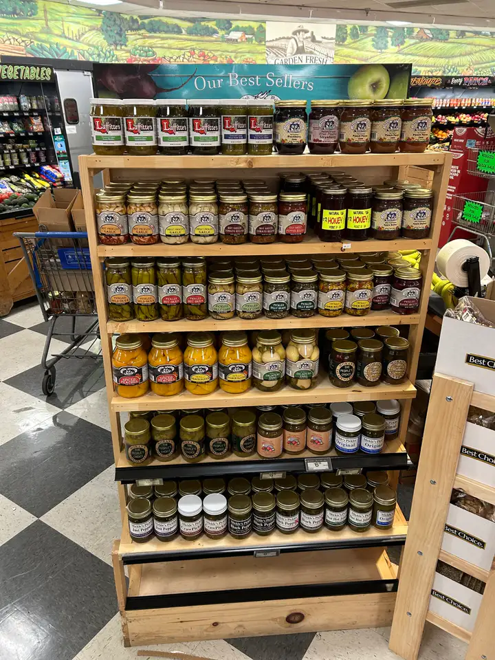 A full display of pickles, preserves, jams, and regional specialties in a Mississippi retail store
